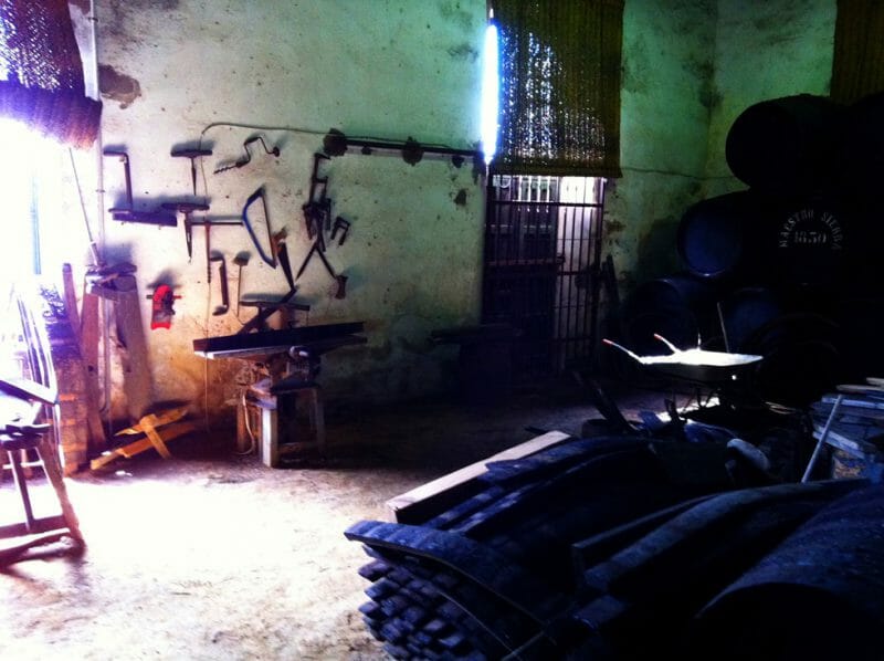 Old and damaged barrels are repaired at the bodega. Photo by Steven Alexander
